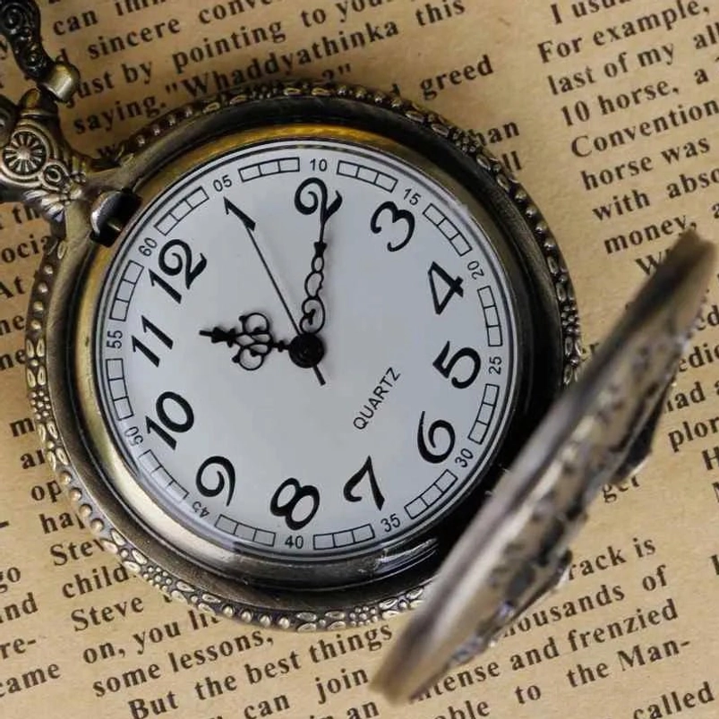 Steampunk pocket watch with white acrylic dial opened flat showing 12-hour numerals and quartz mechanism inside bronze case
