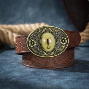 Scorpio steampunk belt featuring hand-carved bronze floral scorpion buckle with intricate inlay on embossed dark brown vegan leather, front flat lay view showcasing ornate buckle detail and premium craftsmanship