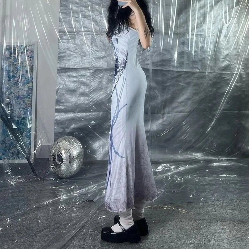 Stretchy steampunk skeleton butterfly slip dress back view showing fishtail hem and form-fitting silhouette