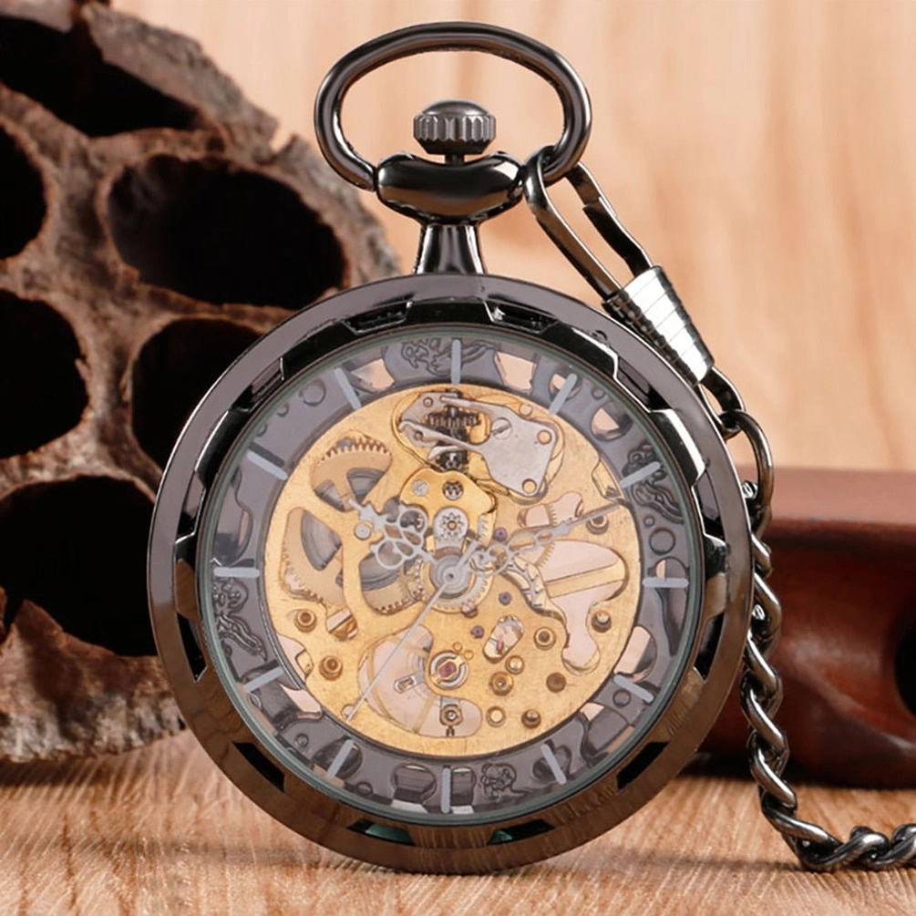 Skeleton pocket watch with engraved roman numerals and golden internal mechanical gears on wooden table with lotus pod decoration