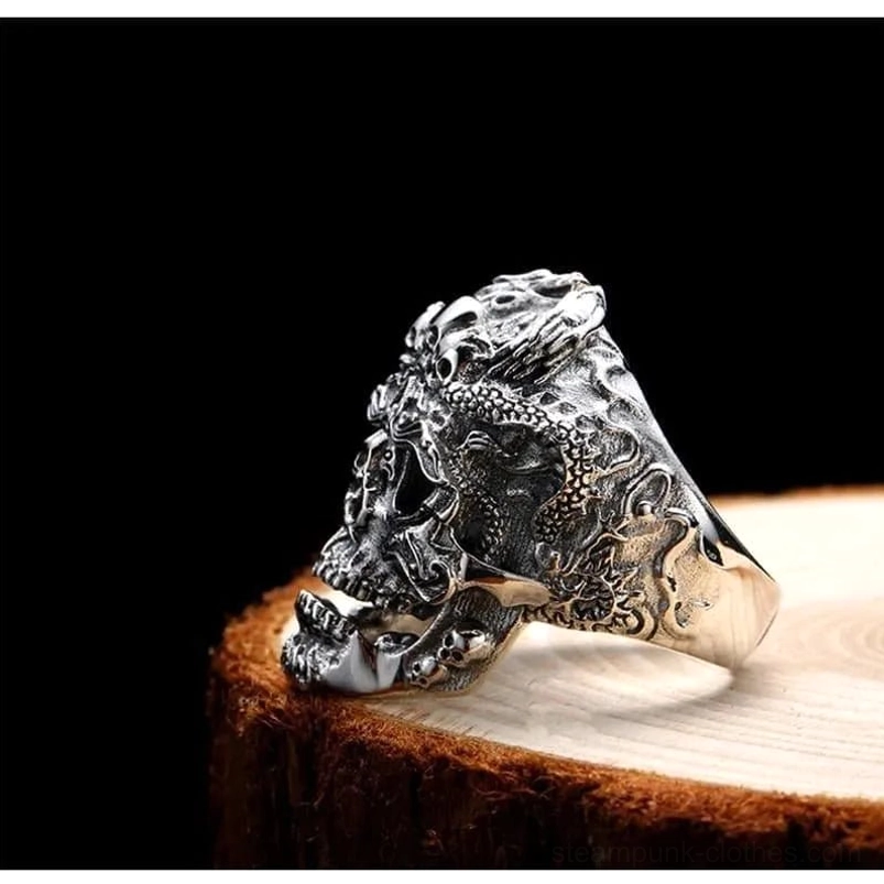 Skull dragon steampunk ring side profile - dark vintage silver finish showing dragon wrapped around skull with sharp carved facial features