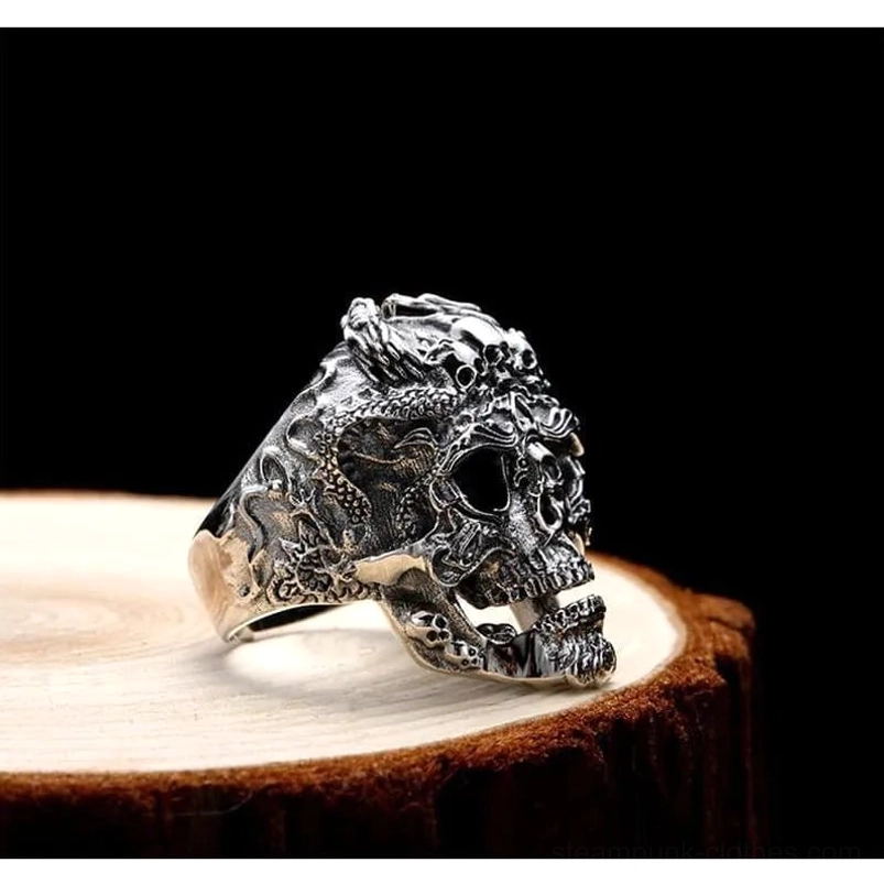Skull dragon steampunk ring side three-quarter view - gothic silver statement jewelry showing intricate carved details and antique silver tone finish