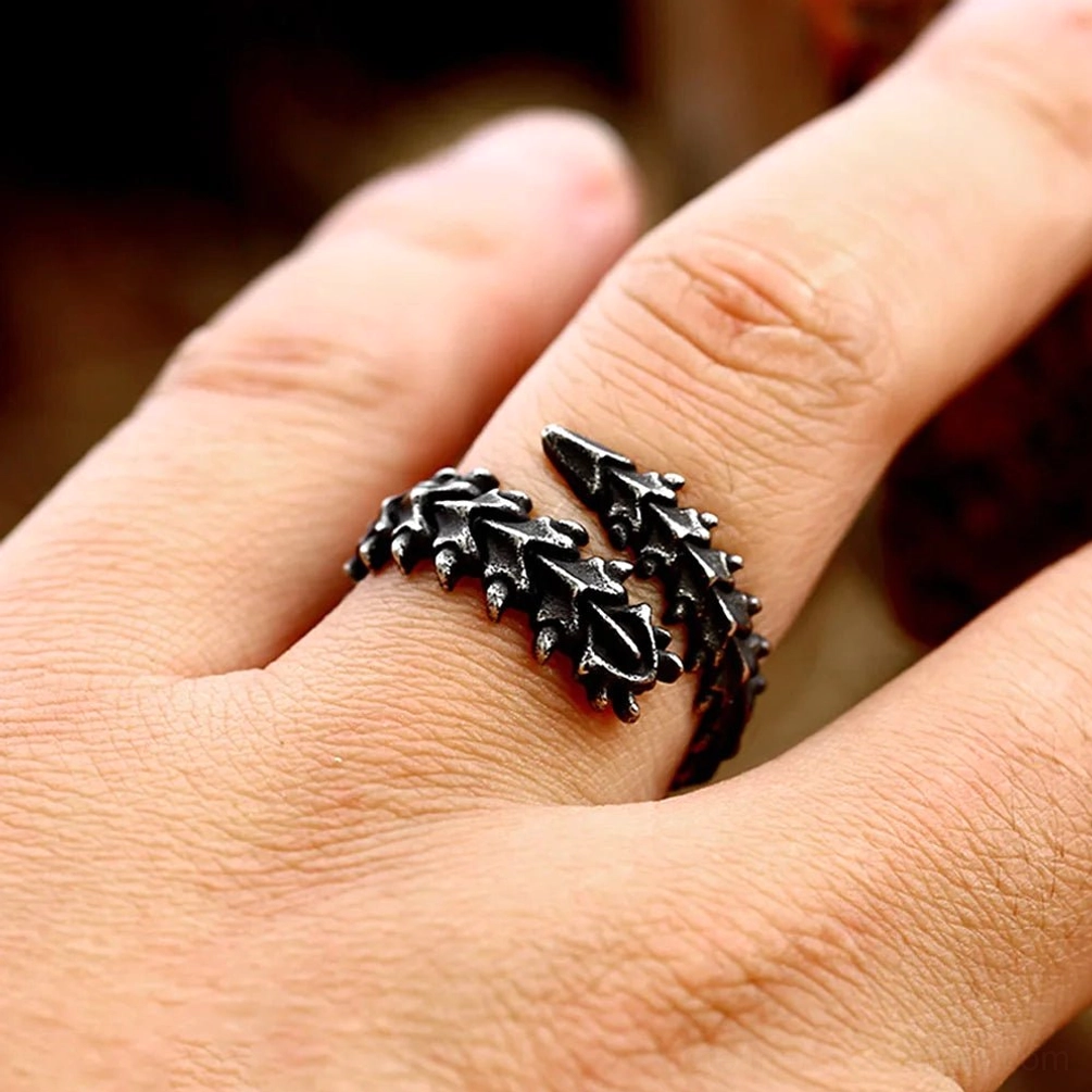 Spinalis steampunk vertebrae ring on hand showing aged black metal finish and comfortable wearability on middle finger