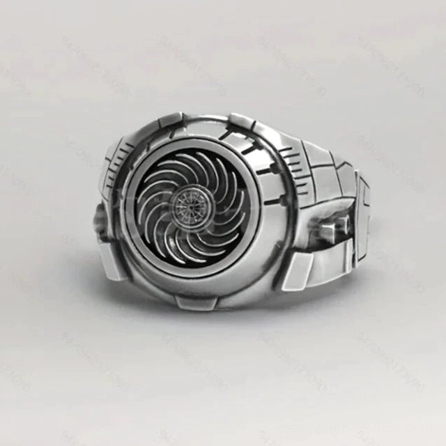 Spiral steampunk ring with turbine center design and segmented band in silver-tone metal, front flat view