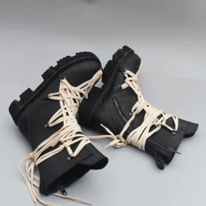 Top-down view of steampunk platform boots showing crisscross lacing with metal eyelets and side zip closure