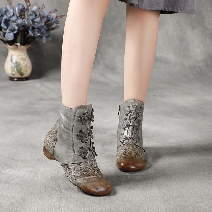 Steampunk boots rear view on model, showcasing frog button fasteners and two-tone brown leather construction