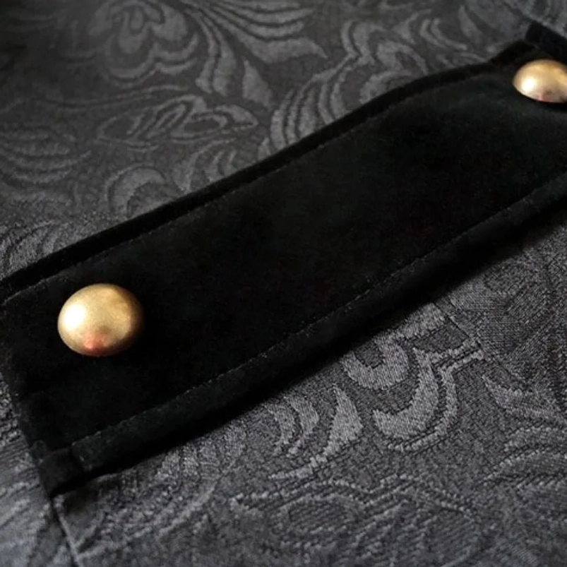 Steampunk coat fabric detail displaying damask jacquard weave pattern and velvet accent trim