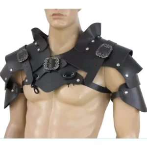 Black steampunk leather shoulder and chest armor on male mannequin torso, front three-quarter studio view with white background, showcasing adjustable straps, ornate carved buckles, industrial metal hardware, and complete silhouette fit