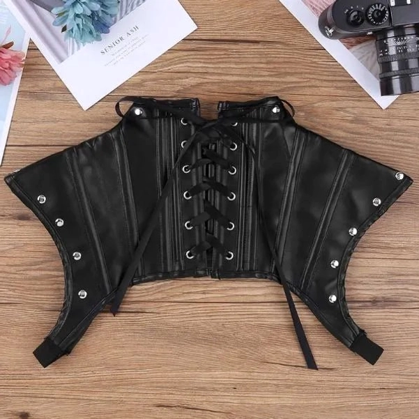 Steampunk armor vest back flat lay view displaying complete lace-up back structure with metal eyelet details and decorative rivets