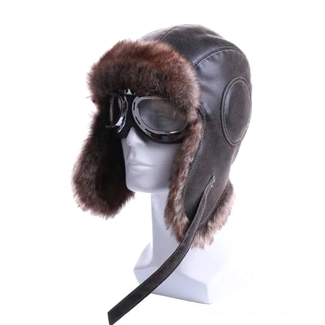Steampunk aviator chapka hat with dark brown leather and clear colorless flight goggles, left three-quarter angle showing detail