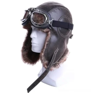 Steampunk aviator trapper hat with dark brown faux leather and silver flight goggles, shown on white male mannequin from left three-quarter view