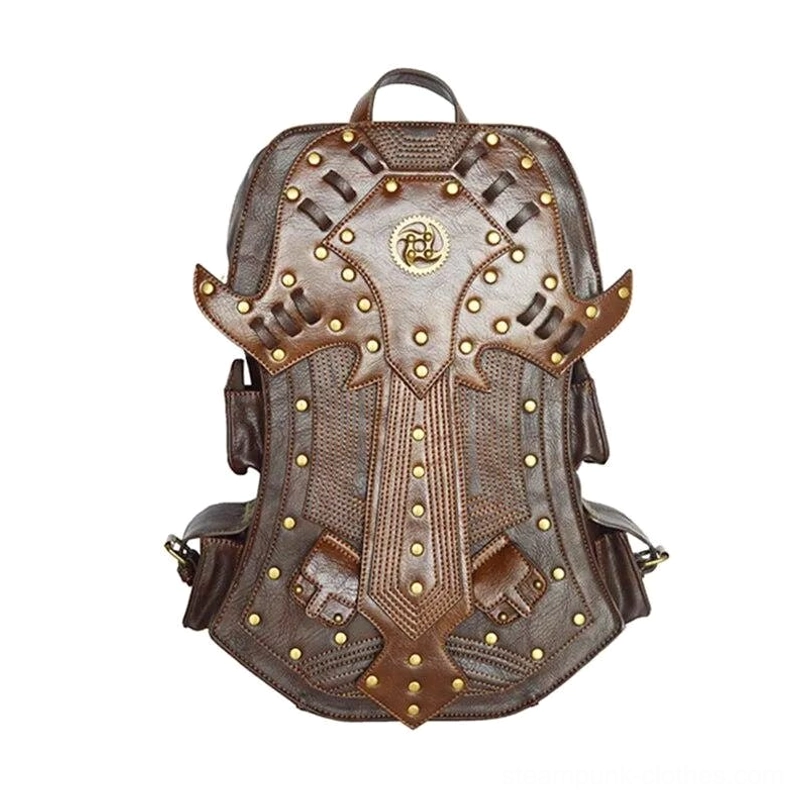 Steampunk leather backpack front flat lay displaying central metal winged emblem, studded armor plating, aged brown leather finish, and overall architectural design aesthetic