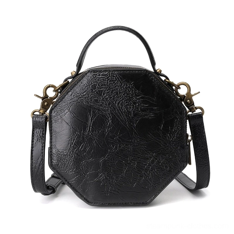 Octagonal steampunk crossbody bag rear view revealing dual brass attachment straps, solid black cracked leather composition, and strap hardware positioning