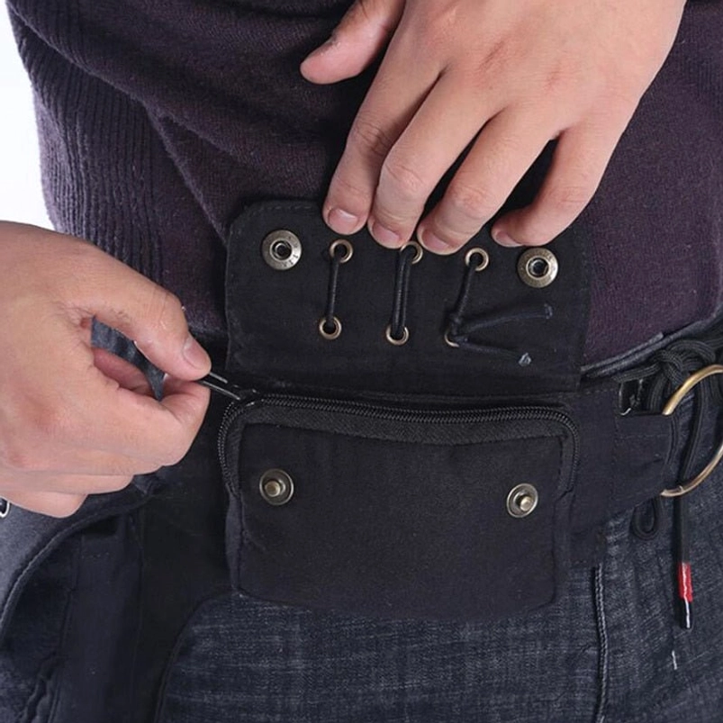 Close-up detail of steampunk bag lace-up fastener system with brass eyelets and authentic mechanical closure, hands adjusting