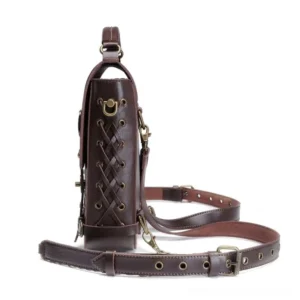 Steampunk crossbody bag side profile featuring adjustable shoulder strap, metal D-rings, brass hardware details, and visible crisscross lace-up construction