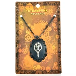 Steampunk bird skull necklace with ornate black metal pendant and chain displayed on retail packaging with industrial gear motif, front view