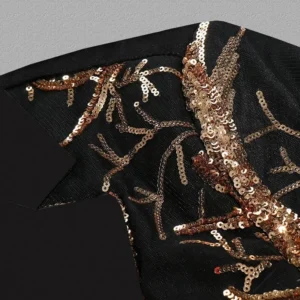 Close-up of gold sequin branch embroidery pattern on black satin lapel of steampunk jacket