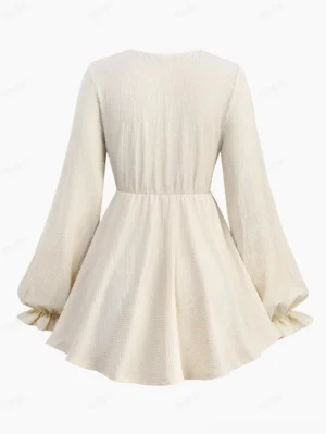 Back view of steampunk layered blouse showing gathered waist and ruffled flared cuffs details