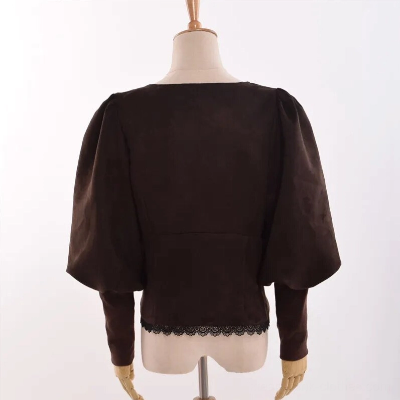 Steampunk blouse rear perspective - fitted waist, lantern-style puff sleeves, black lace hem accent
