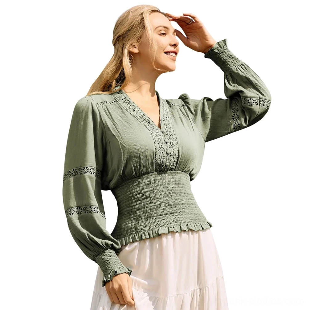 Steampunk blouse three-quarter side view showcasing full lantern sleeves with lace trim and fitted smocked waist detail
