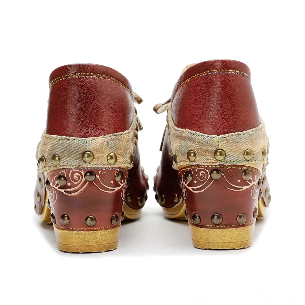 Steampunk leather boots direct rear view showcasing closed heel counter with engraved wooden heel and brass studs