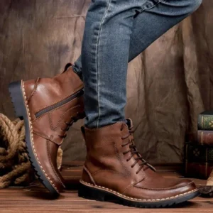 Brown steampunk dandy boots with side zipper and lace-up design worn with blue denim, vintage setting with wooden floor