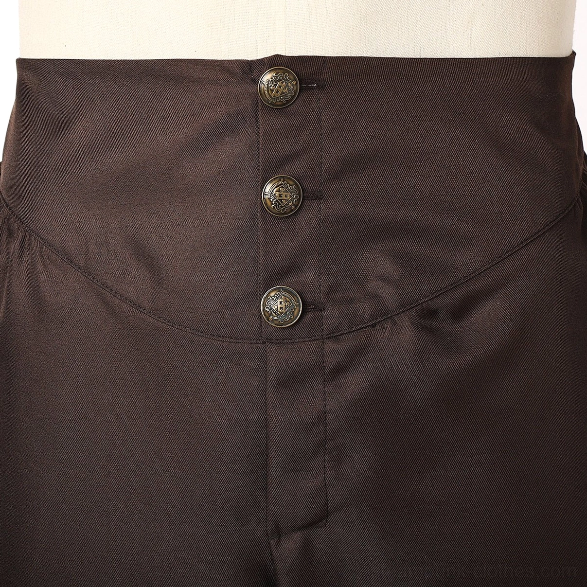 Close-up detail of brown steampunk breeches waistband featuring vintage brass buttons curved waist panel and woven fabric texture
