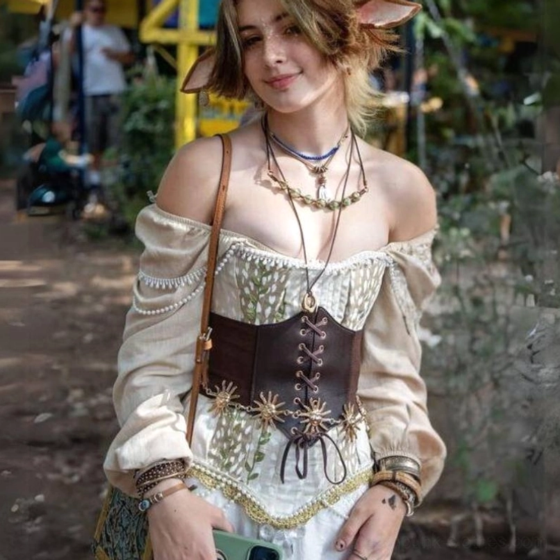 Steampunk brown leather underbust corset belt with layered gold sun chain motifs and precision lace-up front closure, styled at outdoor alternative fashion market showcasing authentic Victorian-industrial fusion
