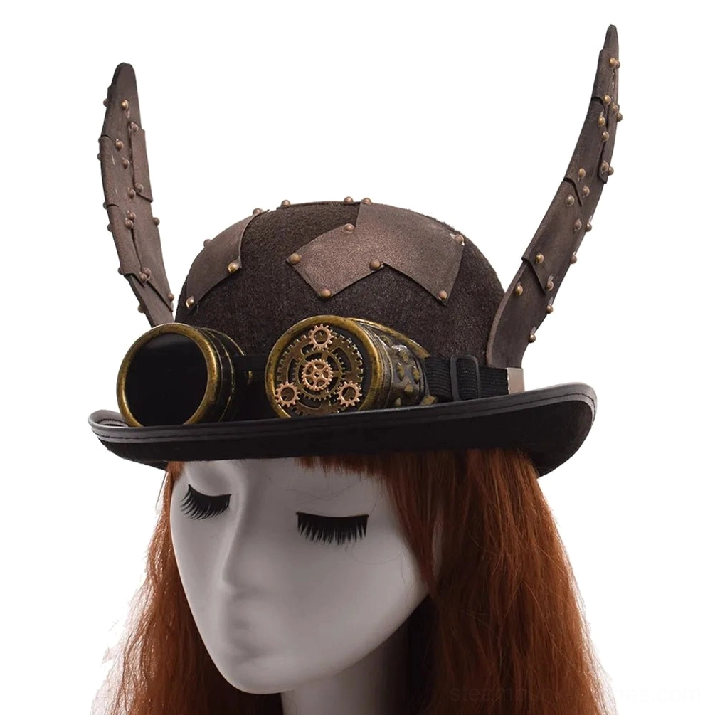 Steampunk bunny ears bowler hat front angle displaying patchwork leather crown accents and brass gear goggles detail