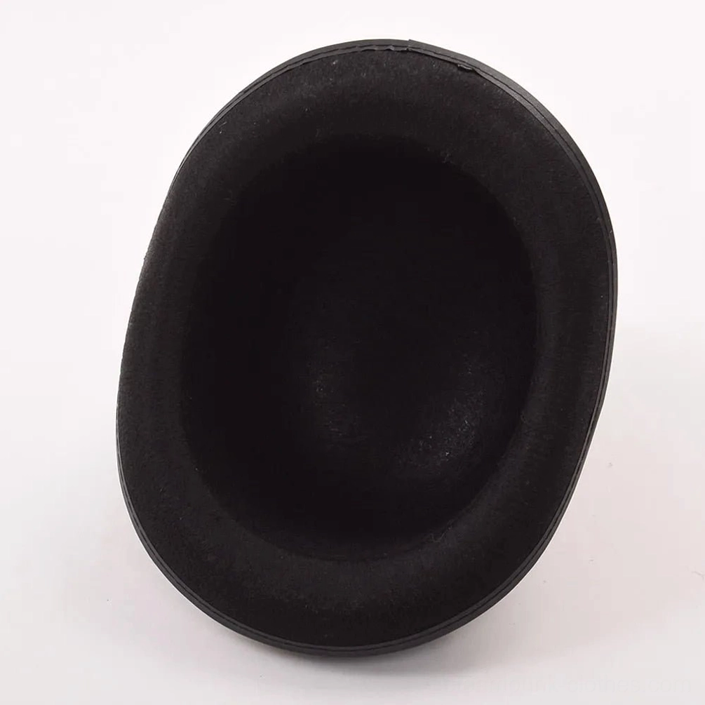 Interior of steampunk bowler hat displaying black felt fabric lining and curved inner brim construction