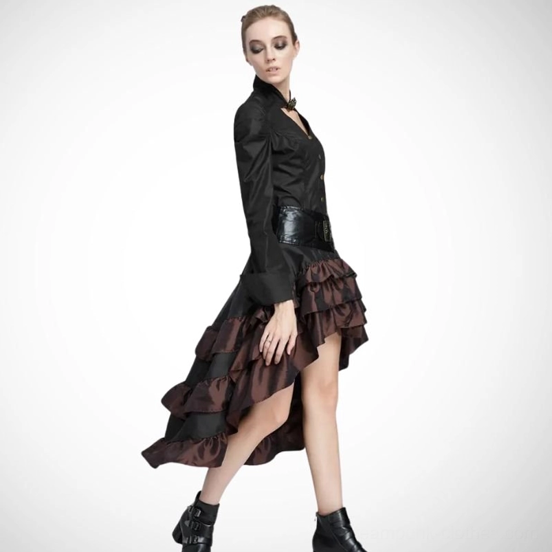 Side view of steampunk tiered bustle skirt with high-low hemline worn with black high-neck long-sleeve top for complete gothic ensemble