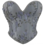 Dusty blue strapless steampunk corset with 3D embroidered butterflies and gold vine details, front view showcasing sweetheart neckline and structured boned silhouette