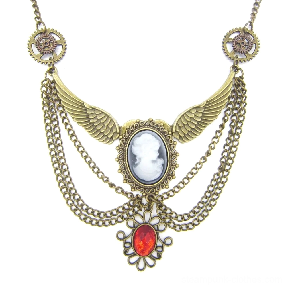 Detailed overhead view of steampunk cameo necklace showing gear-shaped chain connectors and layered tassel chain design in bronze brass tone
