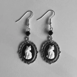 steampunk gothic cat cameo drop earrings with ornate silver filigree frame and black-white cat profile on light background