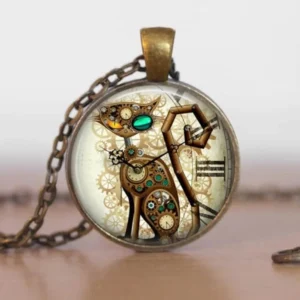 Steampunk mechanical cat pendant necklace with bronze metal frame, glass cabochon, intricate gear details, and glowing green gem eye on wooden desktop