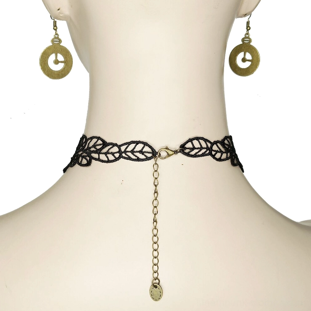 Back view of black lace steampunk choker on mannequin showing adjustable bronze chain tail and clasp mechanism - rear neck presentation