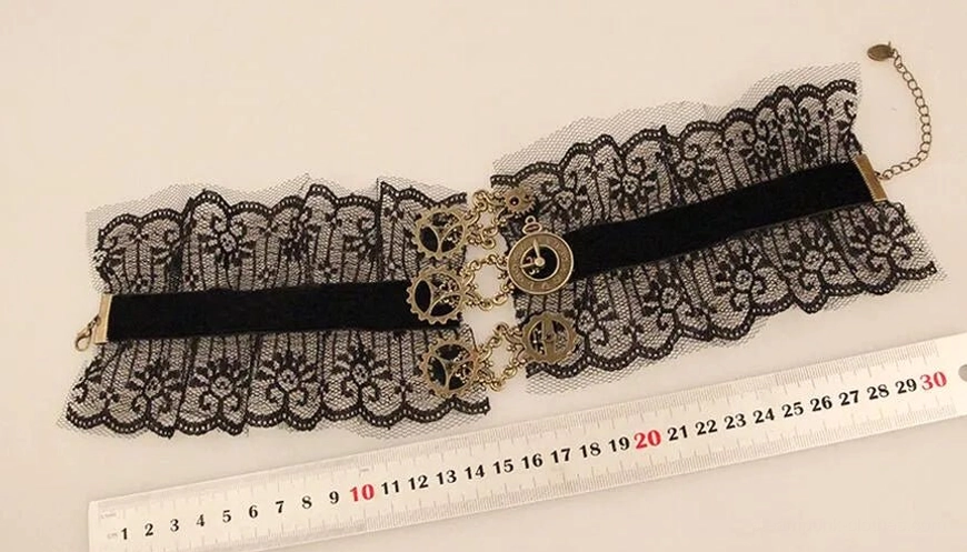 Steampunk choker flat lay showing adjustable chain strap, black lace and velvet band with bronze hardware and measurements