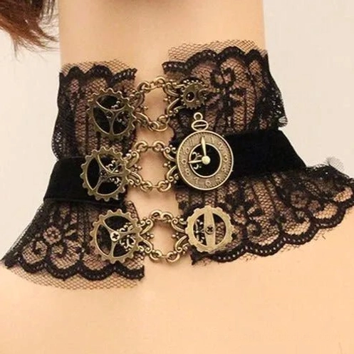 Steampunk choker with scalloped lace ruffle and bronze hardware on mannequin - front close-up view