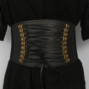 Black steampunk cincher corset belt featuring antique bronze metal fasteners and adjustable drawstring tie, mannequin styling with black lace dress, eye-level studio photography highlighting hardware details