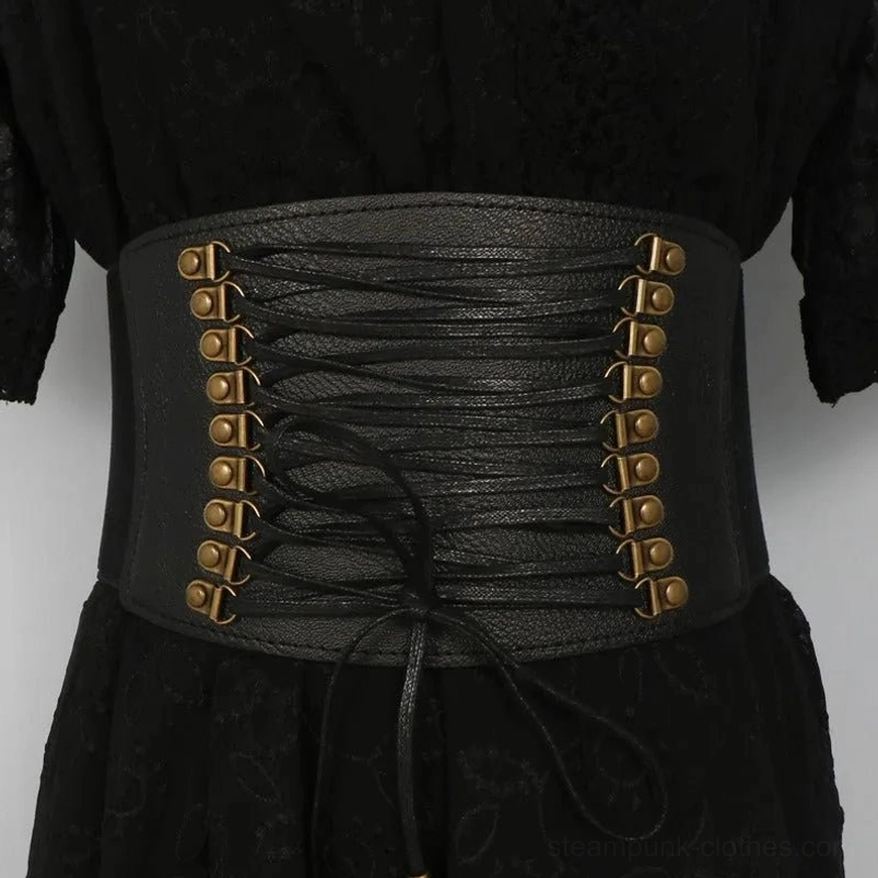 Black steampunk cincher corset belt featuring antique bronze metal fasteners and adjustable drawstring tie, mannequin styling with black lace dress, eye-level studio photography highlighting hardware details
