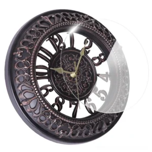 Steampunk wall clock close-up showing dark bronze carved frame detail, gold clock hands, hollowed numeral scale design, and vintage embossed dial center