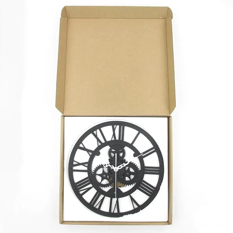 Packaged grey steampunk wall clock in brown cardboard box with foam protective insert for safe shipping and delivery