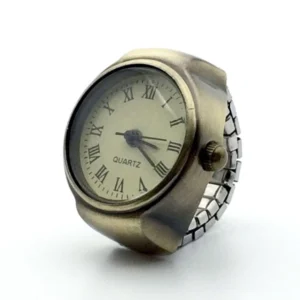 Steampunk quartz clock ring with Roman numerals and bronze metal band, adjustable stretch design on white background
