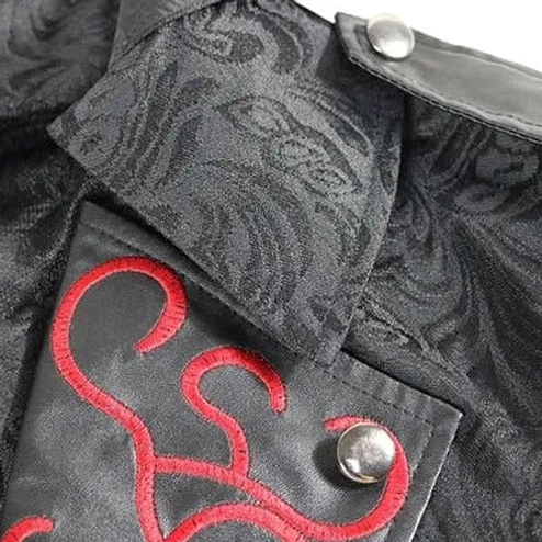 Steampunk coat collar embroidery close-up featuring red curving embroidery design, metal snap buttons, leather trim, and intricate jacquard woven fabric