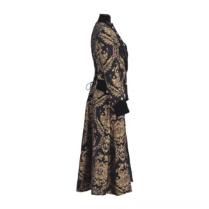Women's steampunk long coat side view showcasing lace-up back corset closure, velvet cuffs, damask print details, and dramatic silhouette