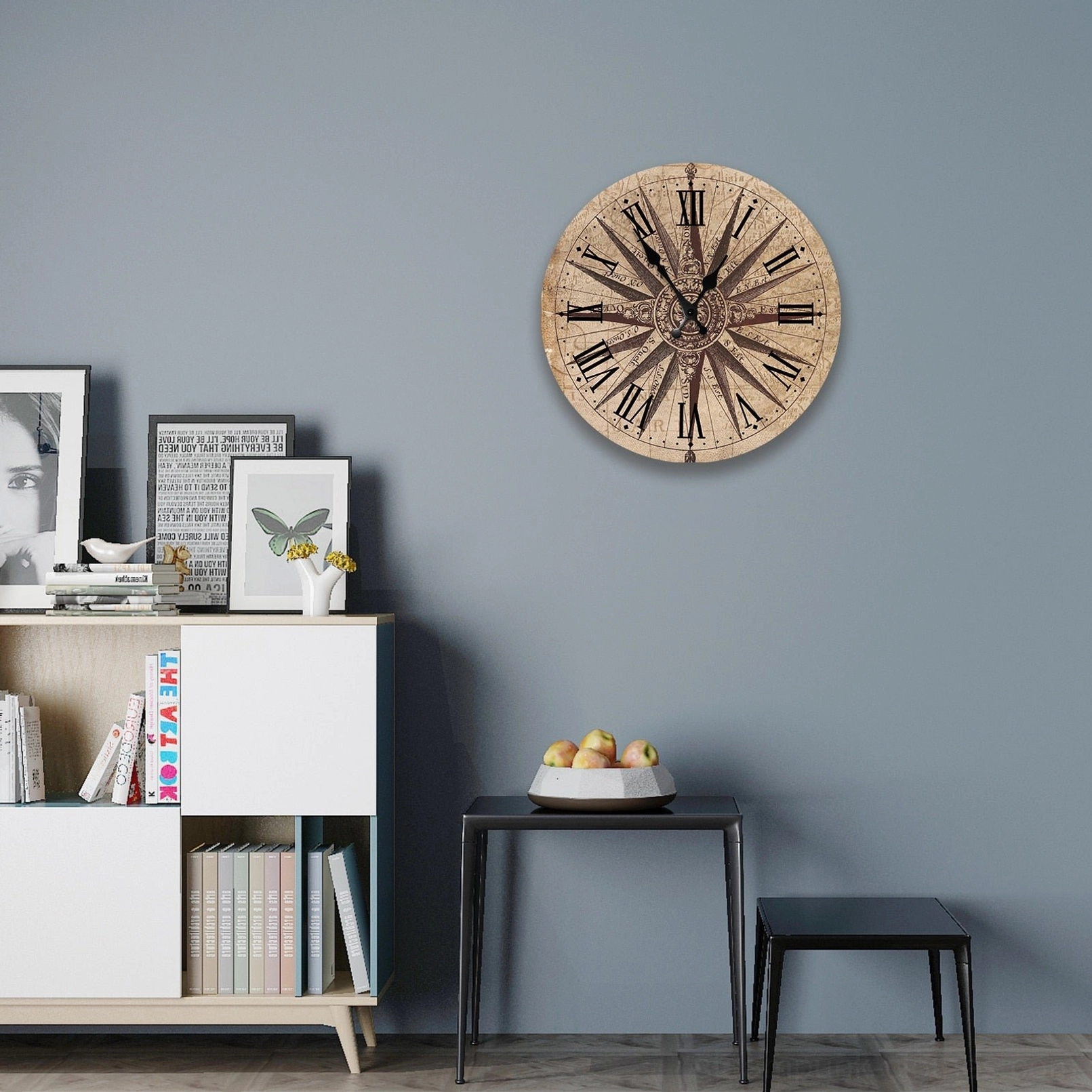 Vintage nautical compass wall clock Compass 2 mounted on gray accent wall in modern living room interior design setting