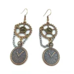 Antique copper plated steampunk pocket watch dangle earrings with gear charm and Roman numeral dial on chain, overhead flat lay view