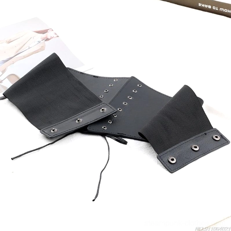 Steampunk waist belt top-down flat lay featuring mixed elastic fabric and faux leather construction with lace-up fastener holes and silver metal rivet accents