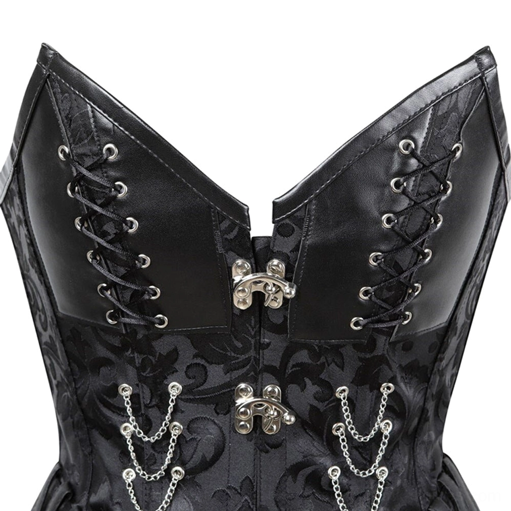 Close-up detail of steampunk corset front showing metal toggle fasteners, decorative chain ornaments, faux leather lace-up closure, and jacquard texture