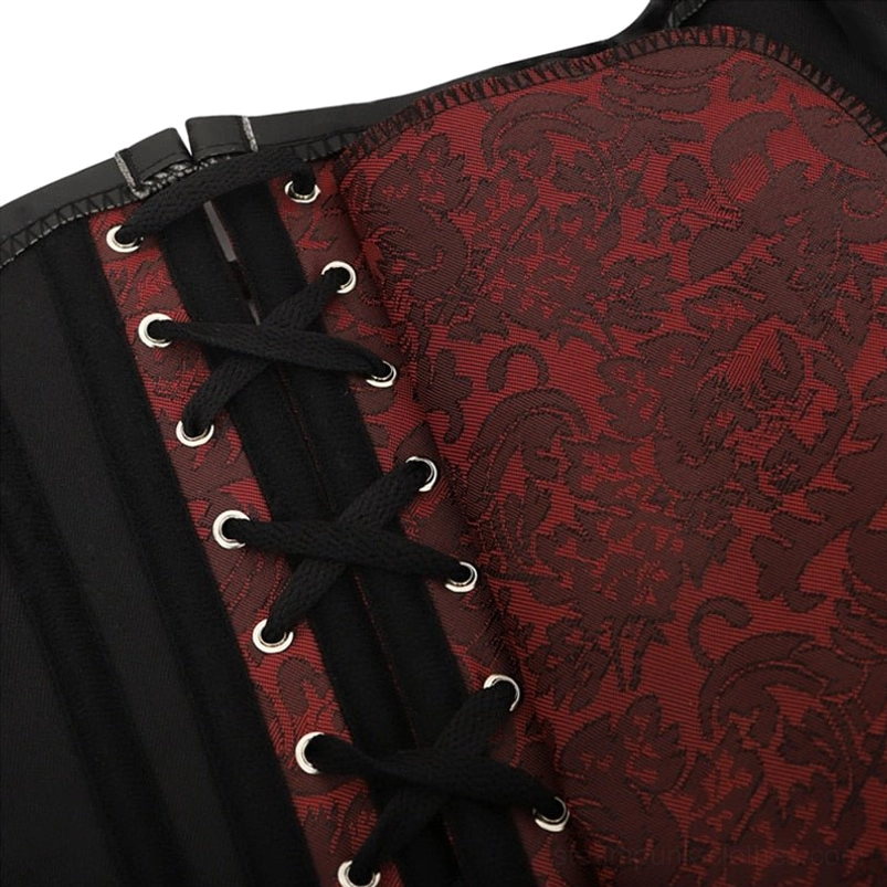 Close-up detail of steampunk corset lacing and wine red jacquard fabric texture